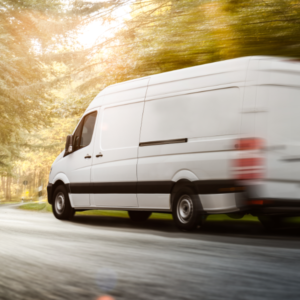 Delivery Van On Wooded Country Road 600X600